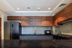 Bright and Spacious 2BR with Maids in Eleganz JVC