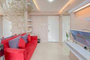 Homey 1BR Apartment @ Bassura City By Travelio