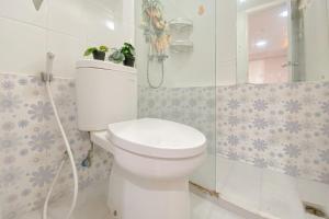 Homey 1BR Apartment @ Bassura City By Travelio