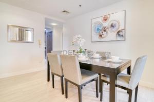 High Floor 2BR With a View of the Dubai Marina Canal Steps Away From the Beach , Shams 1, JBR by Deluxe Holiday Homes