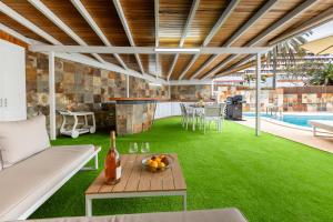 Luxury Villa with Heated Pool, Jacuzzi, Gym, and Gardens