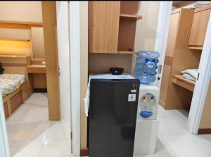 Green pramuka by Santoso Family