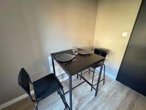 Appartements Suite Romantique - Balneo Prive - Parking : photos des chambres