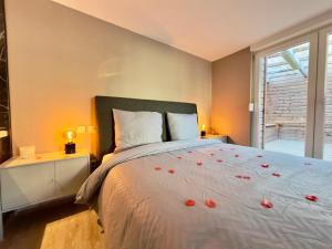 Appartements Suite Romantique - Balneo Prive - Parking : photos des chambres