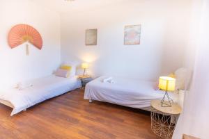 Appartements Le Familial - 2 chambres, 5 min du centre avec jardin : photos des chambres