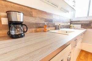 Appartements Le Familial - 2 chambres, 5 min du centre avec jardin : photos des chambres