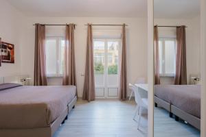 Camera Matrimoniale/Doppia con Letti Singoli con Bagno Privato