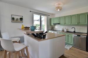 Maisons de vacances Les Mimosas - Jardin clos : photos des chambres