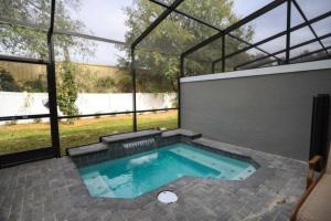 Prime Location 4BD Townhome with pool and Grill