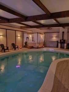 Maisons d'hotes La Grange Aux Hirondelles - Chambre familiale : photos des chambres