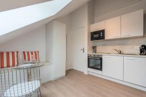 Studio sous les combles côté cour, parking gratuit