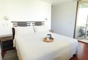 Departamento a pasos del Parque Arauco con piscina en Las Condes con Aire Acondicionado