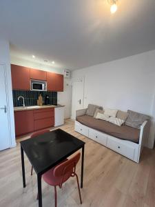 Appartements Le Caracas - Centre ville : photos des chambres