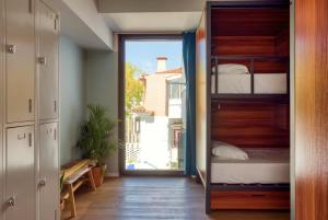 Bed in 10-Bed Mixed Dormitory Room room in Selina Secret Garden Lisbon