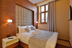 Passpartu Garni hotel Rooms