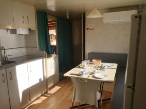Mobile Home room in Camping Paradiso