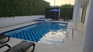 Casa de Verano Girardot, Alemar