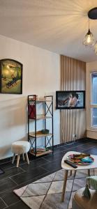 Appartements LA PETITE LUGE studio sur les pistes centre station Super-Besse : photos des chambres