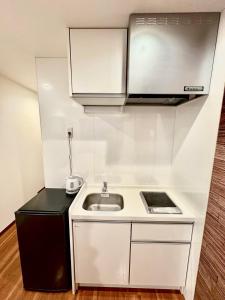 福華ビル106号室