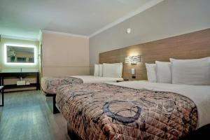 Garden Queen Room with Two Queen Beds  room in Family Garden Inn & Suites
