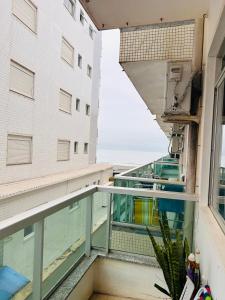 Prédio na Atlântica, pé na areia