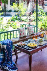 SaffronStays Calamondinn Bungalow - 5BR Colonial Heritage Home within Coffee Plantation in Coorg