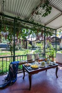 SaffronStays Calamondinn Bungalow - 5BR Colonial Heritage Home within Coffee Plantation in Coorg