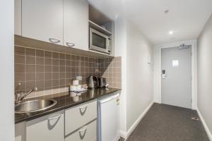 Modern Nomads Beautiful King Studio with Indoor Pool & Balcony