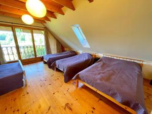Veinbergu guest house by lake n sauna Vidusķēķi
