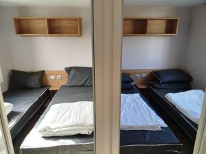 Campings MHVACANCES LOUENT PLUSIEURS MOBILHOMES DANS CAMPING 4 ETOILES PROCHE CHATEAUX et ZOO BEAUVAL : photos des chambres