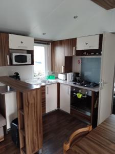 Campings MHVACANCES LOUENT PLUSIEURS MOBILHOMES DANS CAMPING 4 ETOILES PROCHE CHATEAUX et ZOO BEAUVAL : photos des chambres