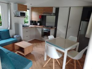 Campings MHVACANCES LOUENT PLUSIEURS MOBILHOMES DANS CAMPING 4 ETOILES PROCHE CHATEAUX et ZOO BEAUVAL : photos des chambres