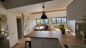 Appartements BAMBOU SERENITE ECO LOGIS -Piscine : photos des chambres