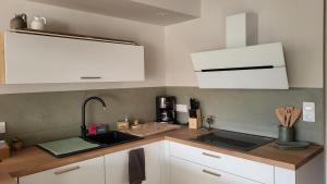 Appartements BAMBOU SERENITE ECO LOGIS -Piscine : photos des chambres