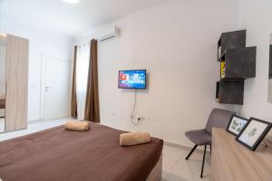 Sliema A25 - 5 mins walk to Valletta Ferry - Shopping Mall and Bay by QuickTrips