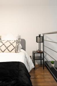 Appartements L-Eden d-Elyse - Duplex premium- parking gratuit : photos des chambres