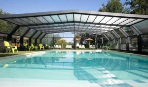 Campings Chalet 4 etoiles - Piscine - ccafdif : photos des chambres