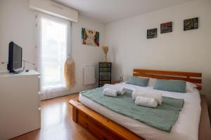 Appartements Parenthese de bonheur - 600 m de la plage : photos des chambres