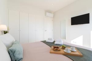 Bright & Spacious Retreat with Balcony by HostWise