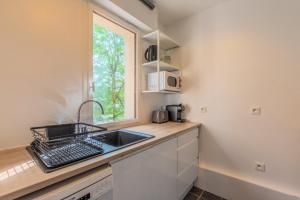 Appartement une chambre avec parking & balcon