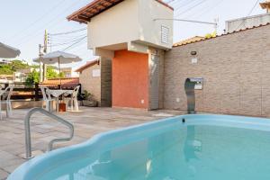 Cabo Frio - Peró - casa em condomínio com piscina e área de lazer, próximo das praias
