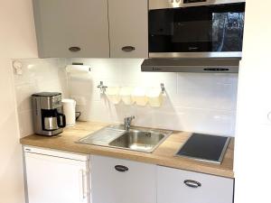 Charmant studio rénové près des pistes avec WiFi gratuit - FR-1-516-175