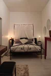 Appartements La Tour des Songes Place Dampmartin Uzes : photos des chambres