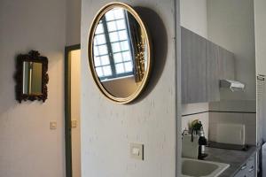 Appartements La Tour des Songes Place Dampmartin Uzes : photos des chambres