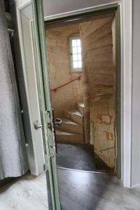 Appartements La Tour des Songes Place Dampmartin Uzes : photos des chambres