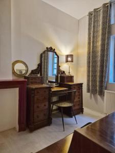 Appartements La Tour des Songes Place Dampmartin Uzes : photos des chambres