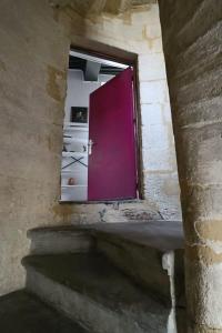 Appartements La Tour des Songes Place Dampmartin Uzes : photos des chambres