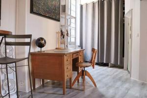 Appartements La Tour des Songes Place Dampmartin Uzes : photos des chambres