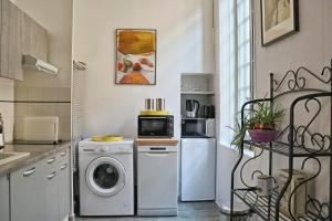 Appartements La Tour des Songes Place Dampmartin Uzes : photos des chambres