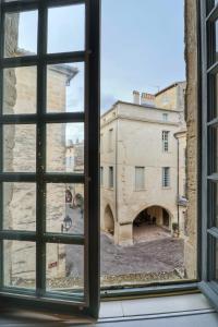 Appartements La Tour des Songes Place Dampmartin Uzes : photos des chambres
